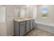 Bathroom boasts double vanity, garden tub, and separate shower at 619 Whitman Ln # 2200, Stockbridge, GA 30281