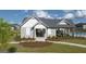 Community clubhouse with a covered patio and adjacent pool at 619 Whitman Ln # 2200, Stockbridge, GA 30281