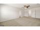 Large bedroom with carpet flooring and access to bathroom at 619 Whitman Ln # 2200, Stockbridge, GA 30281