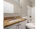 Clean bathroom with granite countertop and bathtub at 78 Candlelight Ln, Atlanta, GA 30331