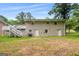 Back of house with deck and grassy yard at 78 Candlelight Ln, Atlanta, GA 30331