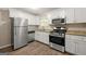 Updated kitchen with stainless steel appliances at 78 Candlelight Ln, Atlanta, GA 30331