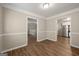 Dining room with hardwood floors and access to kitchen at 78 Candlelight Ln, Atlanta, GA 30331