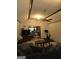 Living room with vaulted ceiling, a ceiling fan and view to dining area at 2531 Quentin Dr, Jonesboro, GA 30236