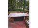 Deck with wooden table and chairs, overlooks backyard at 2531 Quentin Dr, Jonesboro, GA 30236
