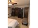 Main bedroom with large TV, dresser and walk-in closet at 2531 Quentin Dr, Jonesboro, GA 30236