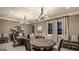 Elegant community room with large table and comfortable seating at 3290 Stock Saddle Pl, Cumming, GA 30040