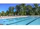 Lap pool and lounge chairs for relaxation at 3290 Stock Saddle Pl, Cumming, GA 30040