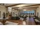 Spacious community room with hardwood floors and fireplace at 3290 Stock Saddle Pl, Cumming, GA 30040