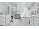 Elegant bathroom with double vanity, soaking tub, and separate shower at 3290 Stock Saddle Pl, Cumming, GA 30040