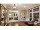 Luxurious sitting area with view into the community dining room at 3290 Stock Saddle Pl, Cumming, GA 30040