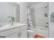 Bathroom with a bathtub, shower, and white vanity at 3290 Stock Saddle Pl, Cumming, GA 30040