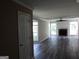 Living room with fireplace and wood-look floors at 4999 Saxony Ct, Stone Mountain, GA 30083