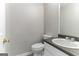 Clean bathroom with vanity, toilet and large mirror at 1125 Misty Meadows Ln, Hampton, GA 30228