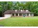 Brick ranch house with attached garage at 3110 Highway 20 W, Hampton, GA 30228