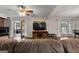 Open living area with hardwood floors and access to sunroom at 3110 Highway 20 W, Hampton, GA 30228
