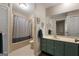 Clean bathroom with a shower/tub combo and updated vanity at 3110 Highway 20 W, Hampton, GA 30228