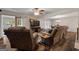 Living room with comfortable seating and a large TV at 3110 Highway 20 W, Hampton, GA 30228