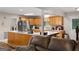 Kitchen with island, wood cabinets, and stainless steel appliances at 3110 Highway 20 W, Hampton, GA 30228