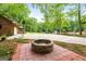Large backyard with fire pit, pond, and basketball court at 3110 Highway 20 W, Hampton, GA 30228