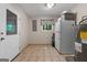 Storage or utility room with refrigerator and water heater at 3110 Highway 20 W, Hampton, GA 30228