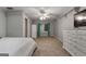 Spacious bedroom with carpet, ceiling fan, and plenty of closet space at 3110 Highway 20 W, Hampton, GA 30228
