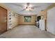 Versatile bonus room with carpet, ceiling fan, and ample storage at 3110 Highway 20 W, Hampton, GA 30228