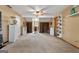 Large bonus room with carpet, ceiling fan, and abundant storage at 3110 Highway 20 W, Hampton, GA 30228