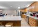 Spacious kitchen with ample cabinetry, stainless steel appliances, and an island at 3110 Highway 20 W, Hampton, GA 30228