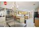 Kitchen with breakfast bar, ample cabinetry, and tile flooring at 710 Stonehenge Pl, Jonesboro, GA 30236