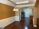 Dining room with hardwood floors and kitchen view at 1218 Heartwood Ave, Mcdonough, GA 30253