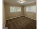 Bright bedroom with neutral walls and carpet at 3207 Cloverhurst Dr, East Point, GA 30344