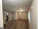 Spacious living room with vinyl flooring and a ceiling fan at 3207 Cloverhurst Dr, East Point, GA 30344