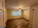 Spacious bedroom with vinyl flooring, ceiling fan, and ample natural light at 3207 Cloverhurst Dr, East Point, GA 30344