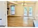 Bright dining area with hardwood floors and access to deck at 3515 Sheree Trl, Stone Mountain, GA 30087