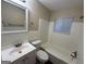 Clean bathroom with a bathtub, toilet and vanity at 2213 Westover Dr, East Point, GA 30344