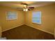 Spacious bedroom featuring ceiling fan and neutral decor at 2213 Westover Dr, East Point, GA 30344