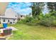 Backyard with grassy area and patio at 1705 Labonte Pkwy, Mcdonough, GA 30253