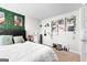 Bedroom with a queen bed, wall decor, and a door at 1705 Labonte Pkwy, Mcdonough, GA 30253