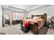 Main bedroom with king-size bed and large mirror at 1705 Labonte Pkwy, Mcdonough, GA 30253