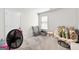 Cozy bedroom with a comfortable chair and plenty of natural light at 1705 Labonte Pkwy, Mcdonough, GA 30253
