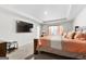 Large main bedroom with a king-size bed and large TV at 1705 Labonte Pkwy, Mcdonough, GA 30253