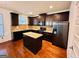 Modern kitchen with granite countertops and stainless steel appliances at 700 Emporia Loop, Mcdonough, GA 30253