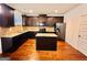 Modern kitchen with granite countertops and stainless steel appliances at 700 Emporia Loop, Mcdonough, GA 30253