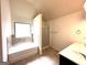 Bathroom boasts a garden tub, shower, and double vanity at 700 Emporia Loop, Mcdonough, GA 30253