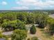 Aerial view of property with large trees at 1142 Harbins Rd, Dacula, GA 30019