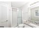 Clean bathroom, featuring a shower/tub combo and granite vanity at 7325 Czar Pl, Riverdale, GA 30296