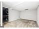 Spacious unfinished basement with neutral carpeting at 7325 Czar Pl, Riverdale, GA 30296