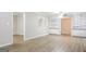 Dining room with built-in shelving and hardwood floors at 7325 Czar Pl, Riverdale, GA 30296