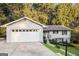 Two-car garage with driveway at 7325 Czar Pl, Riverdale, GA 30296